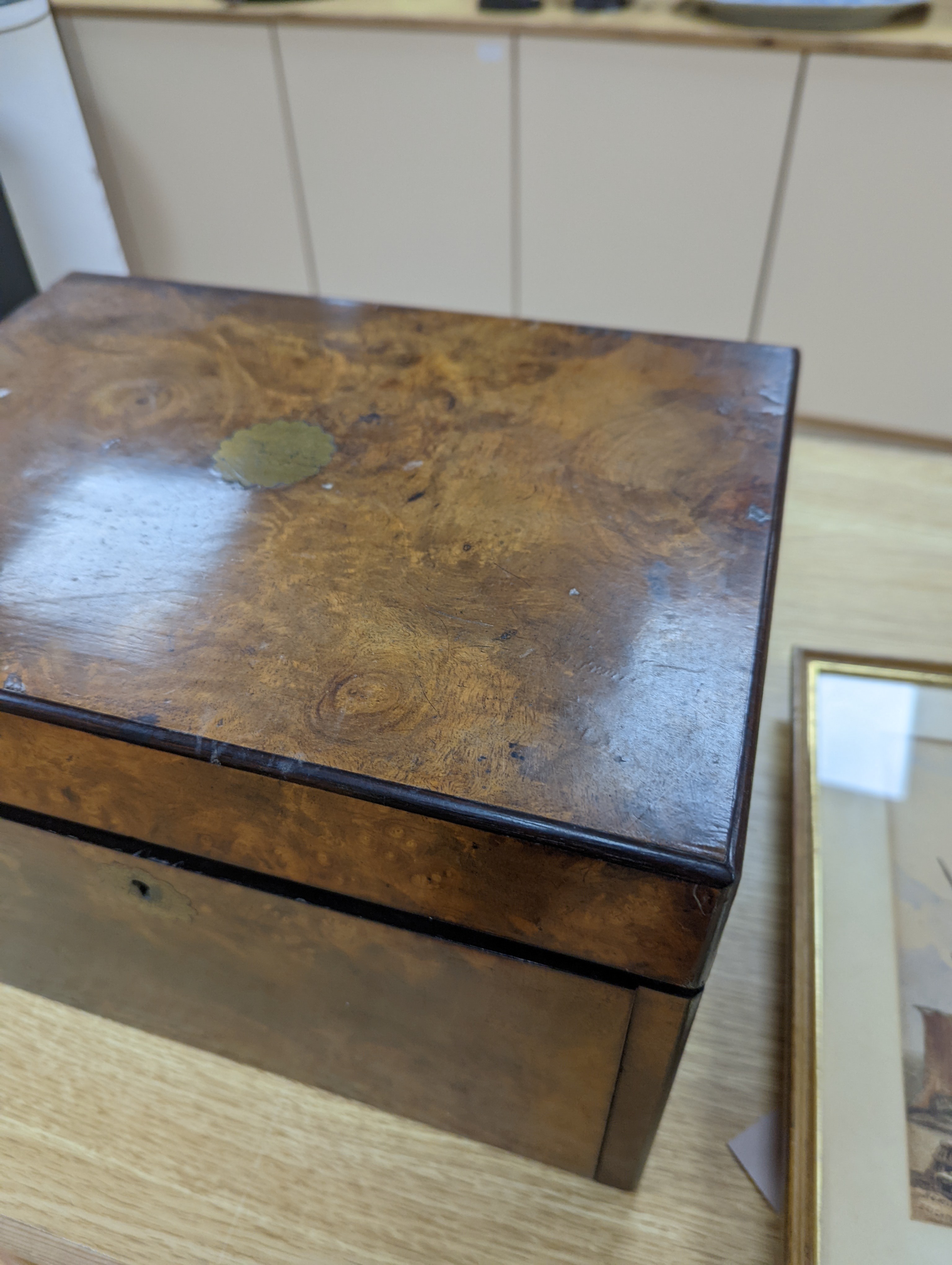 A Victorian walnut sewing casket, 34cm, containing sewing related accessories
